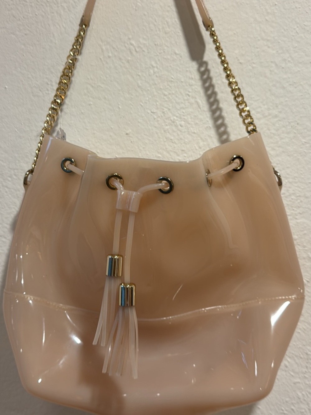 Kartell Stylish Nude Bucket Bag with Gold Chain Strap